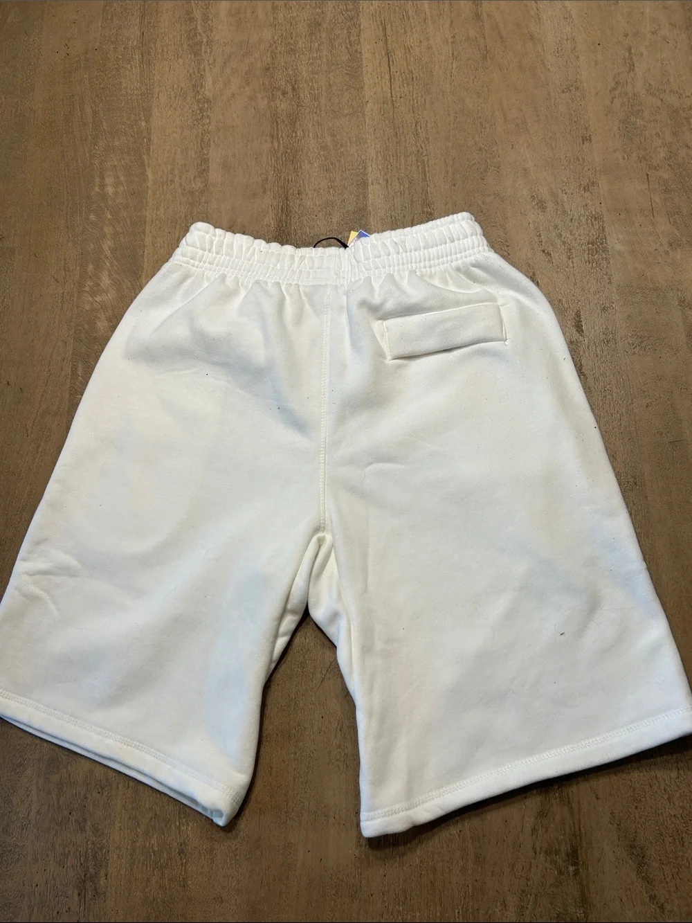 Corteiz Men's White Athletic Shorts with Dark Script Accent Medium